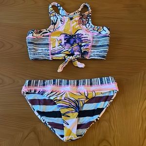 Never worn Maaji Swim Girls Size 16. Reversible 2 patterns.